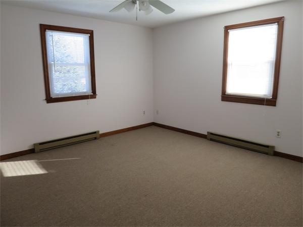22 Lynch Road Wales, MA 01081 - Photo 7 of 11 an empty room with a window