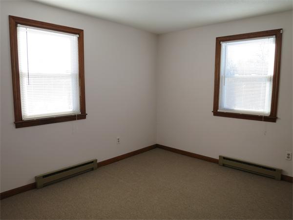 22 Lynch Road Wales, MA 01081 - Photo 8 of 11 an empty room with a window