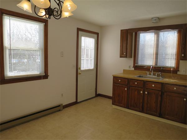 22 Lynch Road Wales, MA 01081 - Photo 10 of 11 a spacious bathroom with a double vanity sink and a mirror
