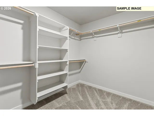 a view of an empty walk in closet