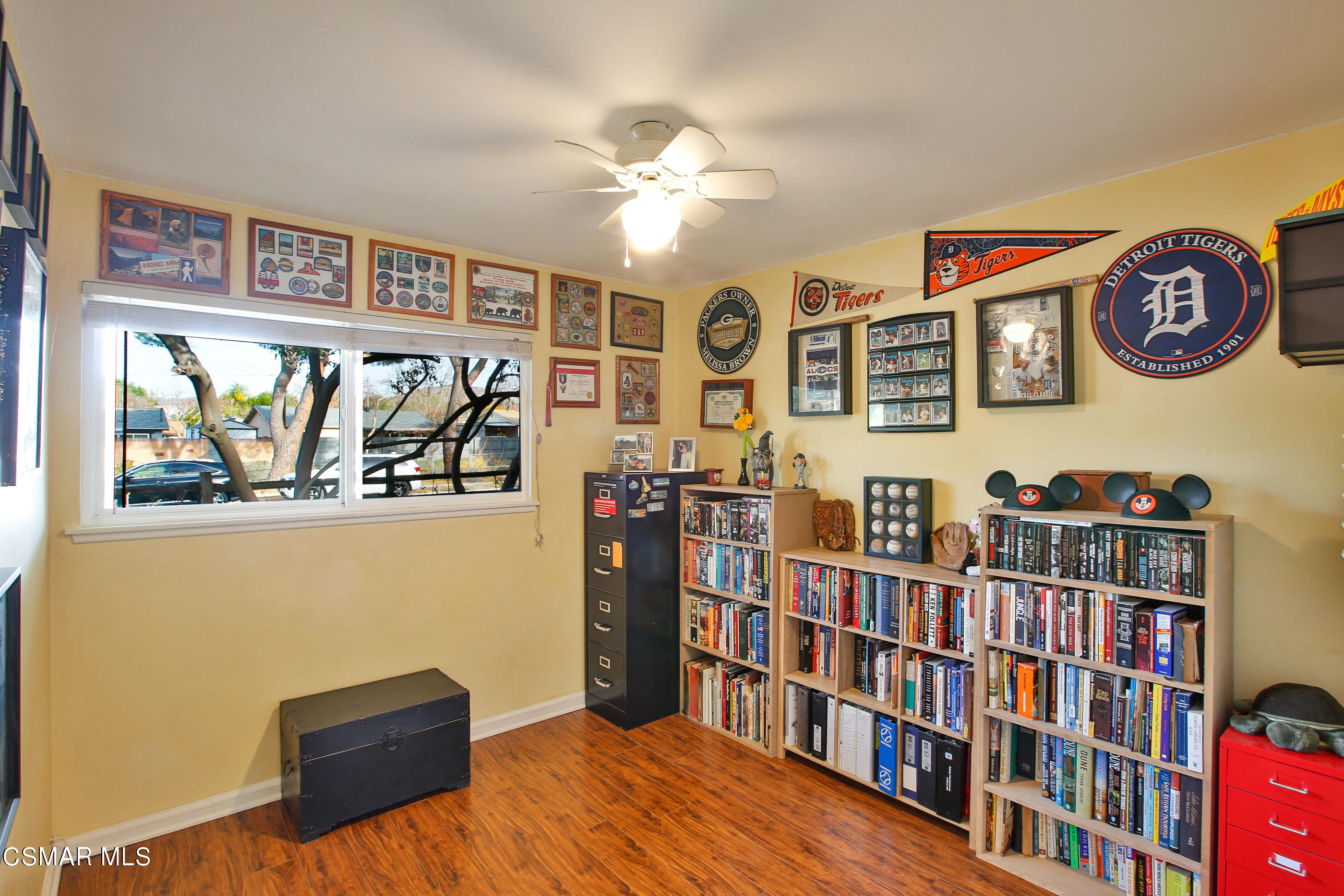 807 Talbert Avenue Simi Valley, CA 93065 - Photo 17 of 33 a living room with bookshelf and book shelf