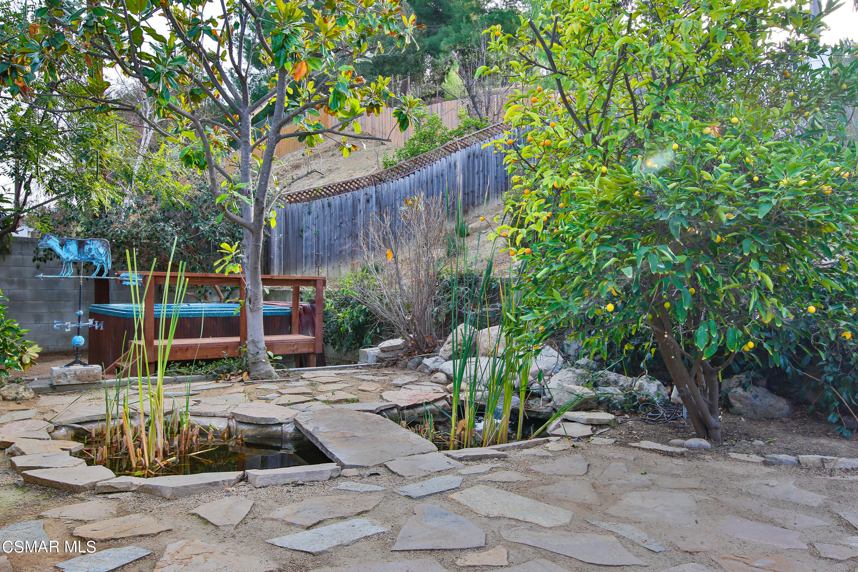 807 Talbert Avenue Simi Valley, CA 93065 - Photo 24 of 33 a view of a backyard with plants and trees