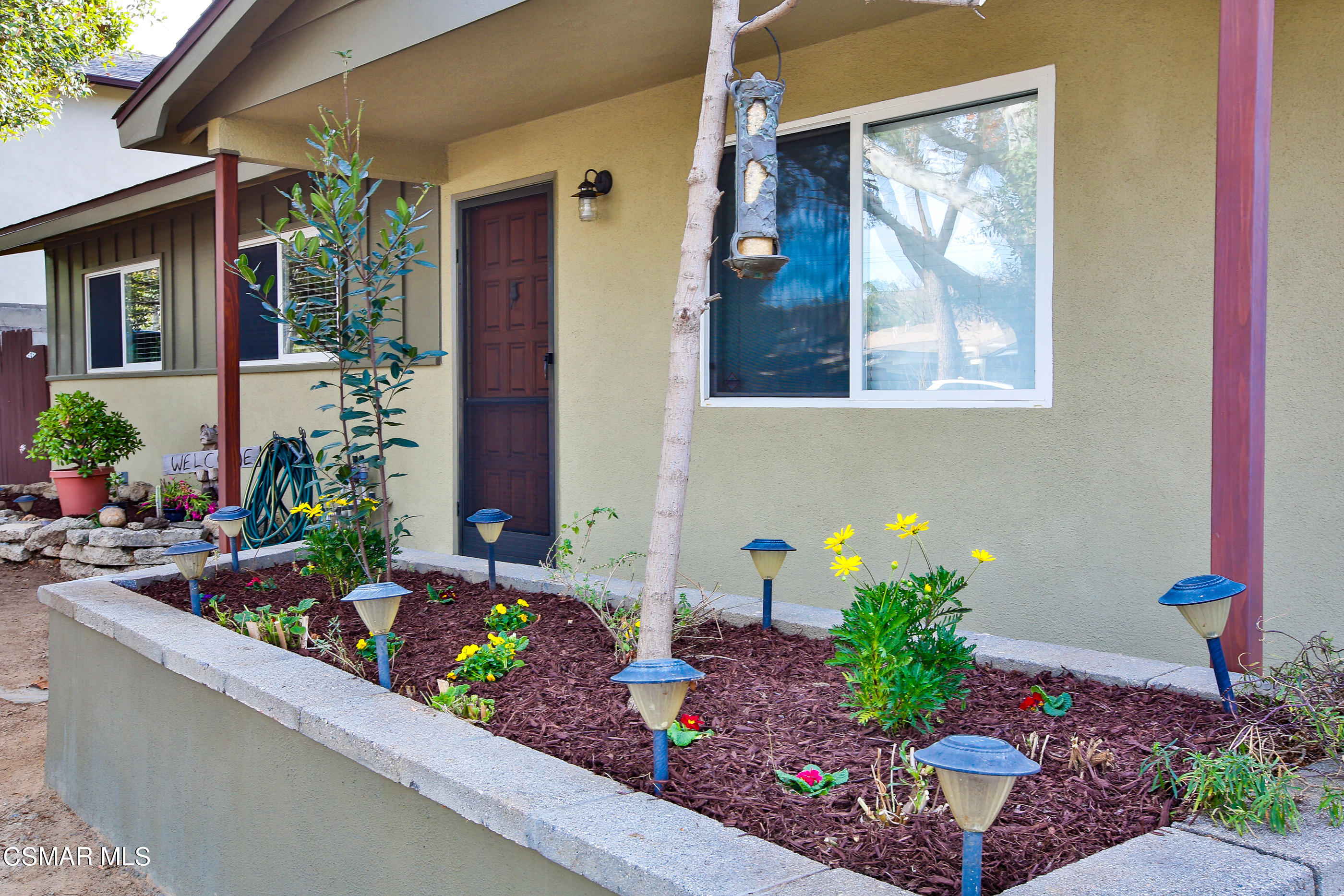 807 Talbert Avenue Simi Valley, CA 93065 - Photo 5 of 33 a view of two chairs in front of a house