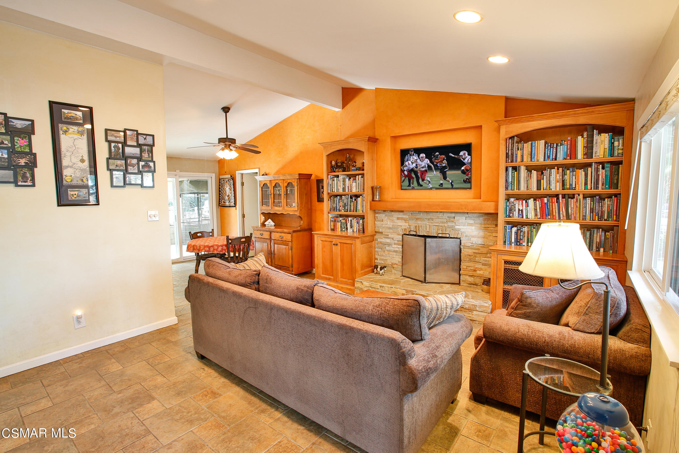 807 Talbert Avenue Simi Valley, CA 93065 - Photo 6 of 33 a living room with furniture a rug and a wall painting