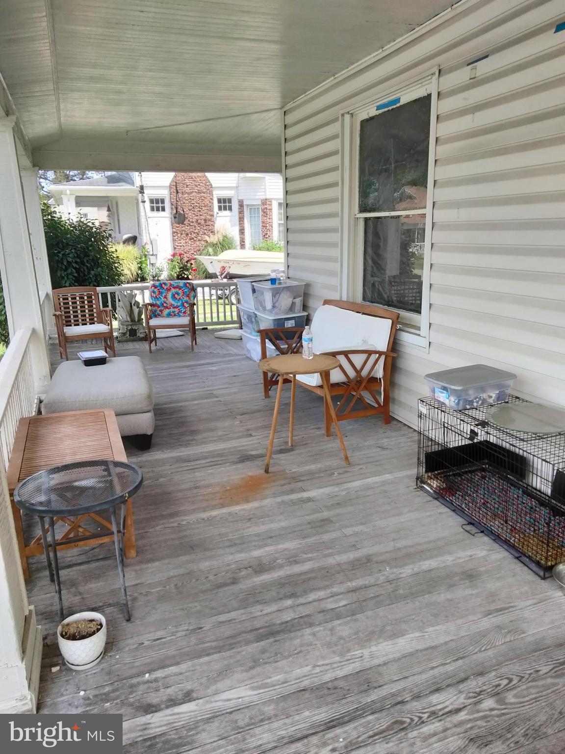 7411 Main Street Willards, MD 21874 - Photo 2 of 43 a living room filled with furniture window and a table
