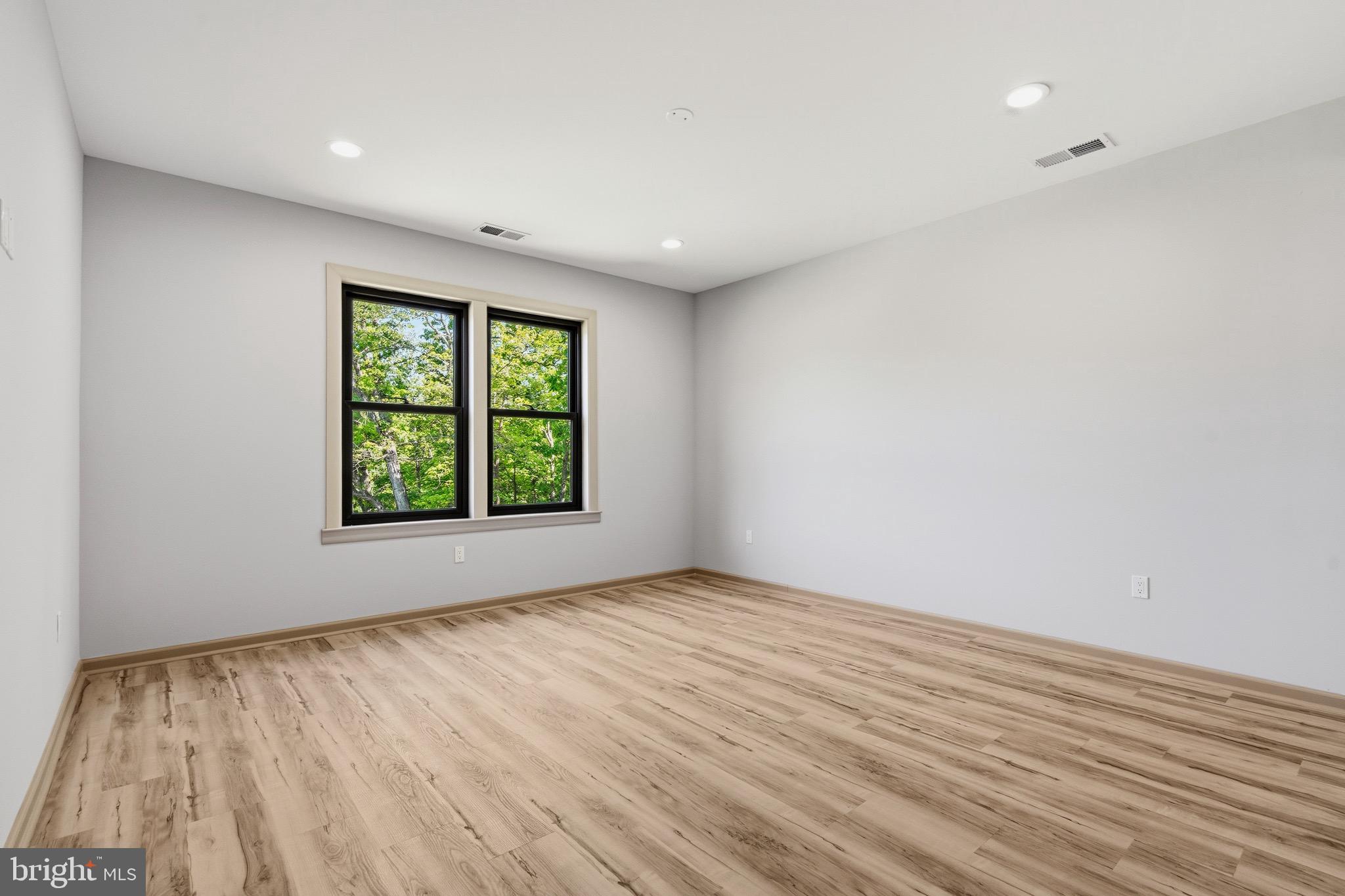 24035 New Mountain Road Aldie, VA 20105 - Photo 113 of 118 wooden floor in an empty room with a window