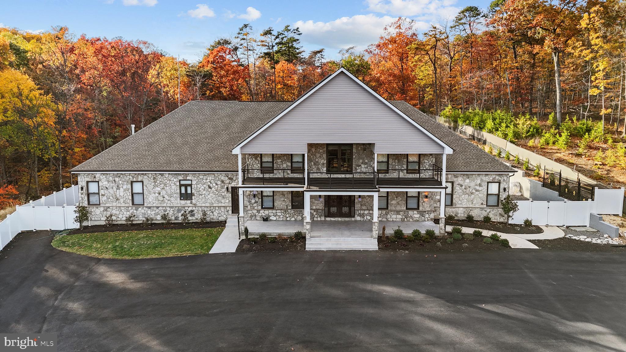 24035 New Mountain Road Aldie, VA 20105 - Photo 2 of 118 a front view of a house with a yard