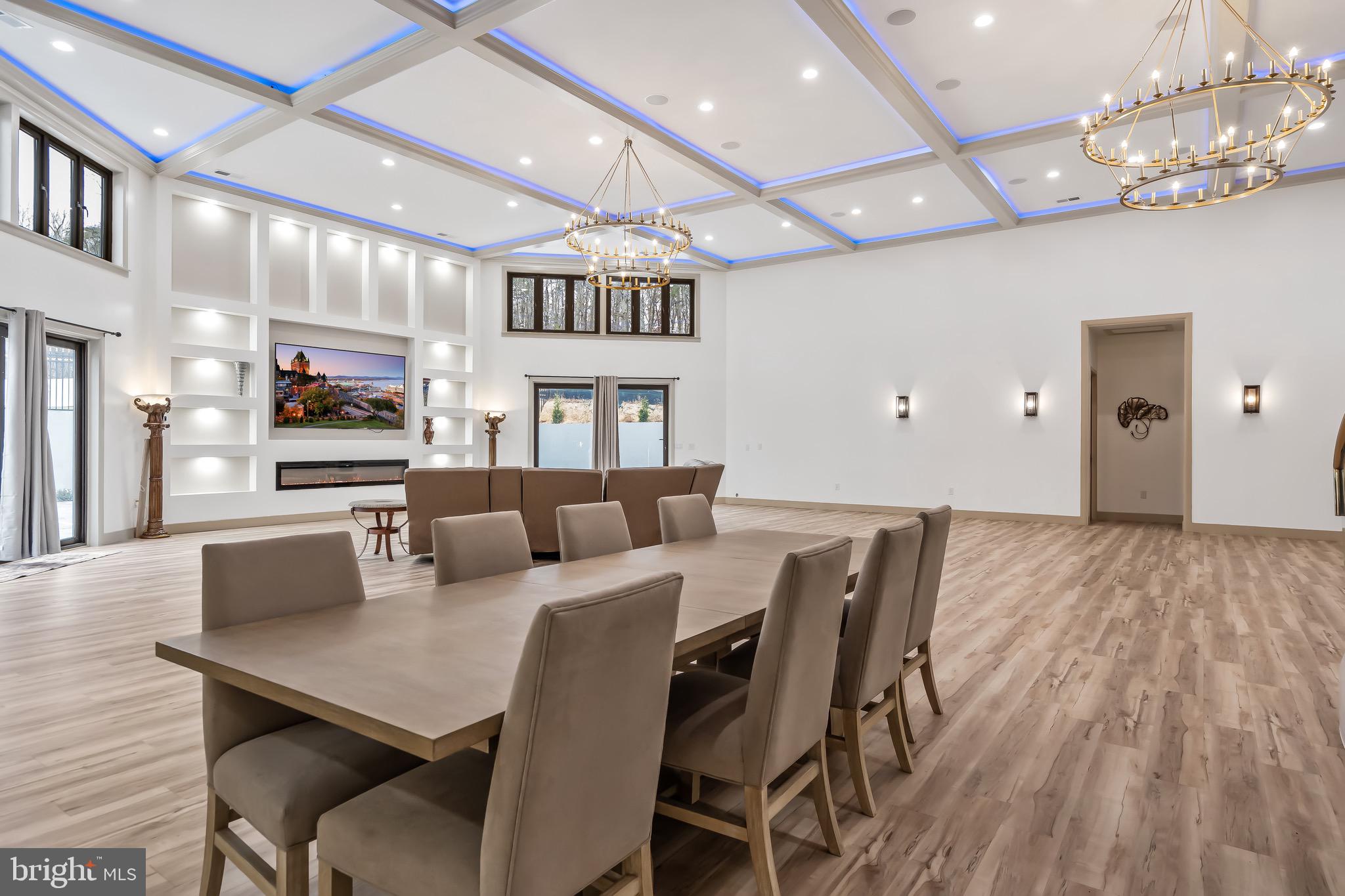 24035 New Mountain Road Aldie, VA 20105 - Photo 28 of 118 a view of a dining room with furniture wooden floor and chandelier