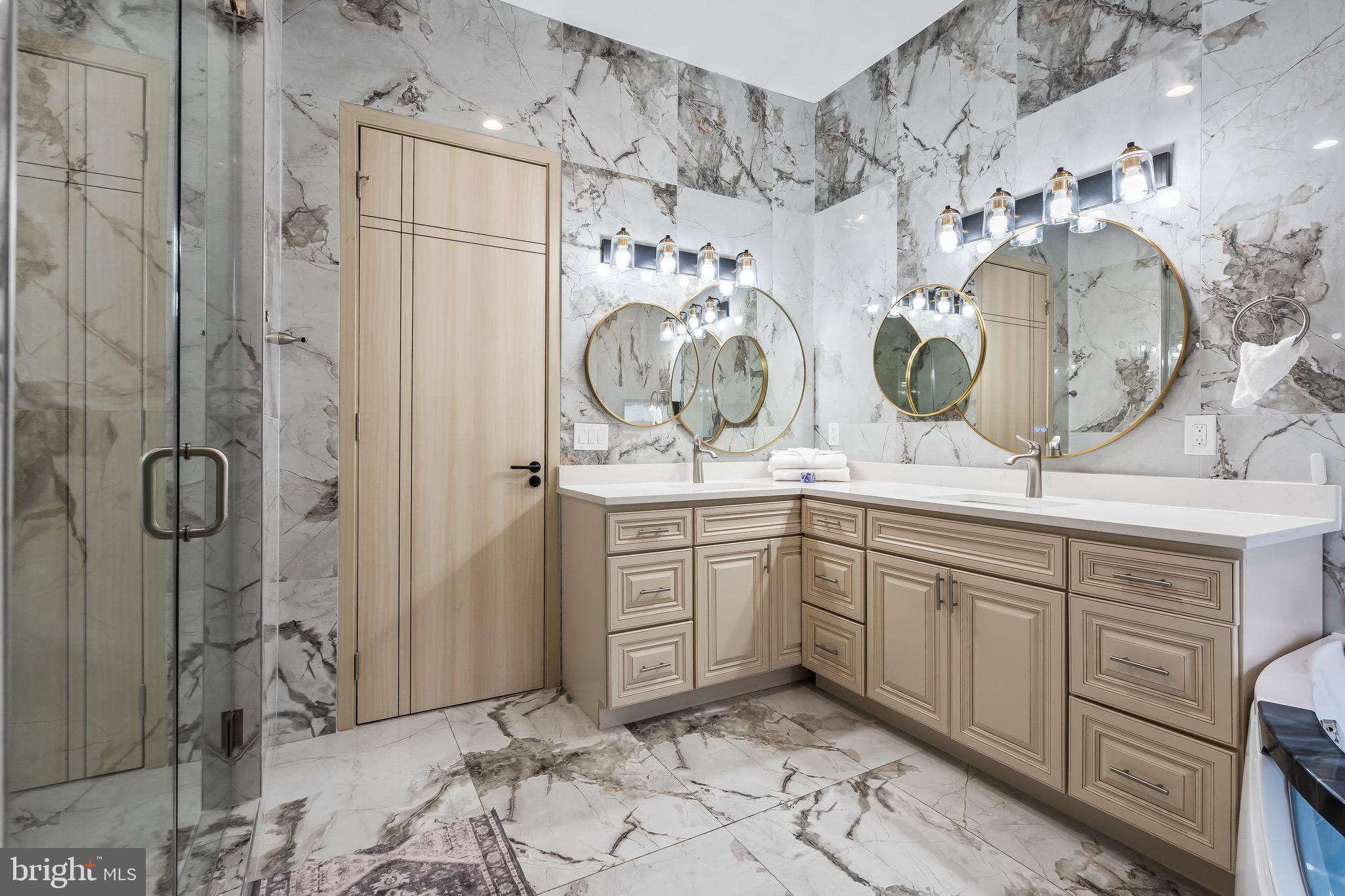 24035 New Mountain Road Aldie, VA 20105 - Photo 67 of 118 a spacious bathroom with a sink mirror and vanity