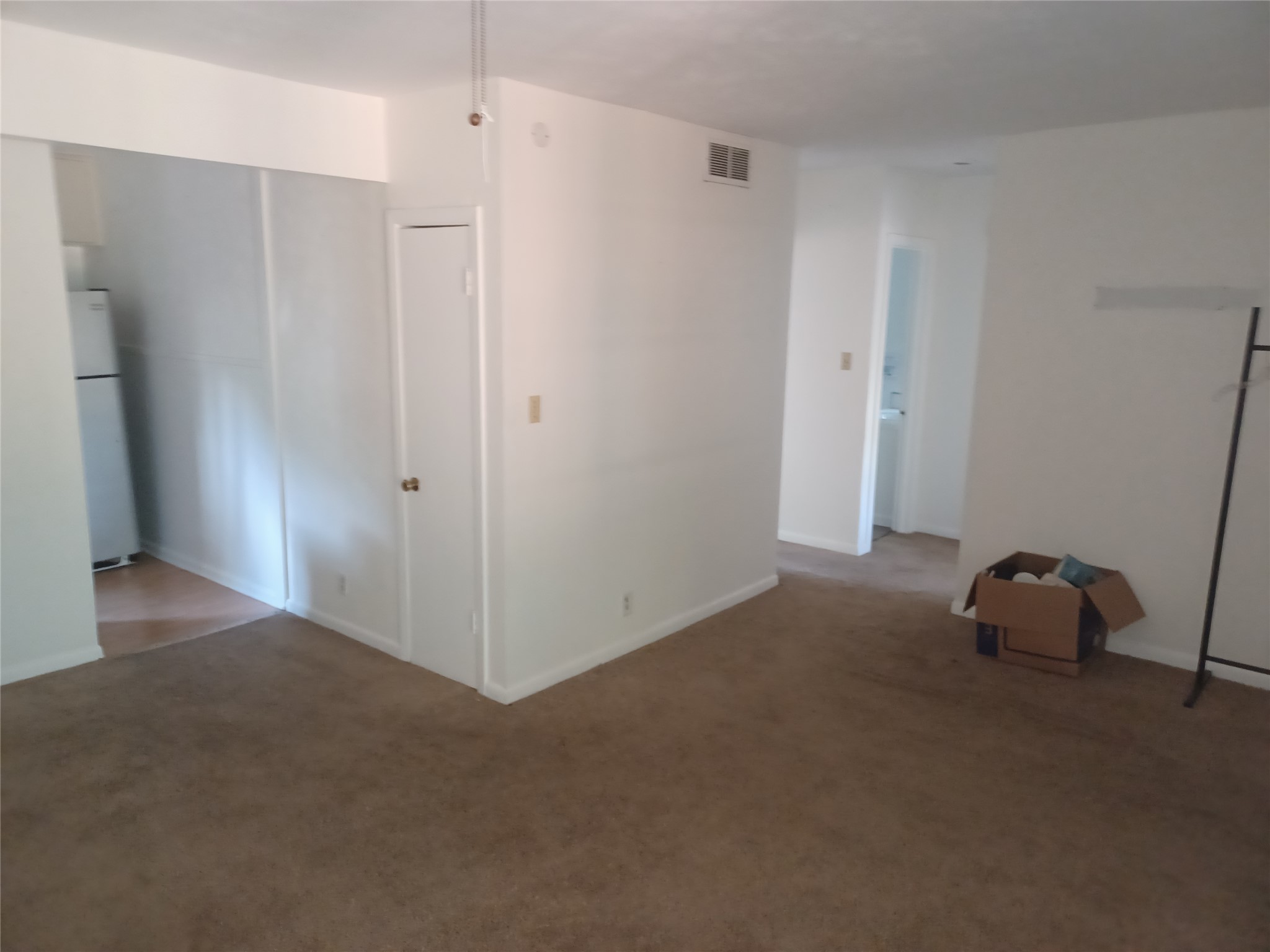 2808 Windsor Road, Unit B Austin, TX 78703 - Photo 12 of 15 Large living and dining area with a small closet and double windows