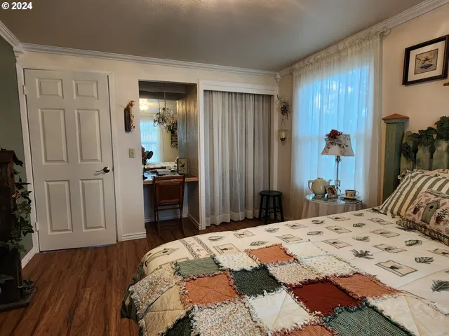 a bedroom with a bed and a walk in closet