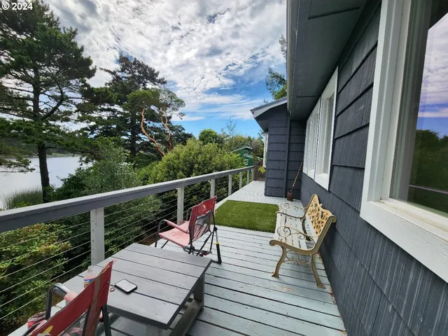 a view of deck with furniture