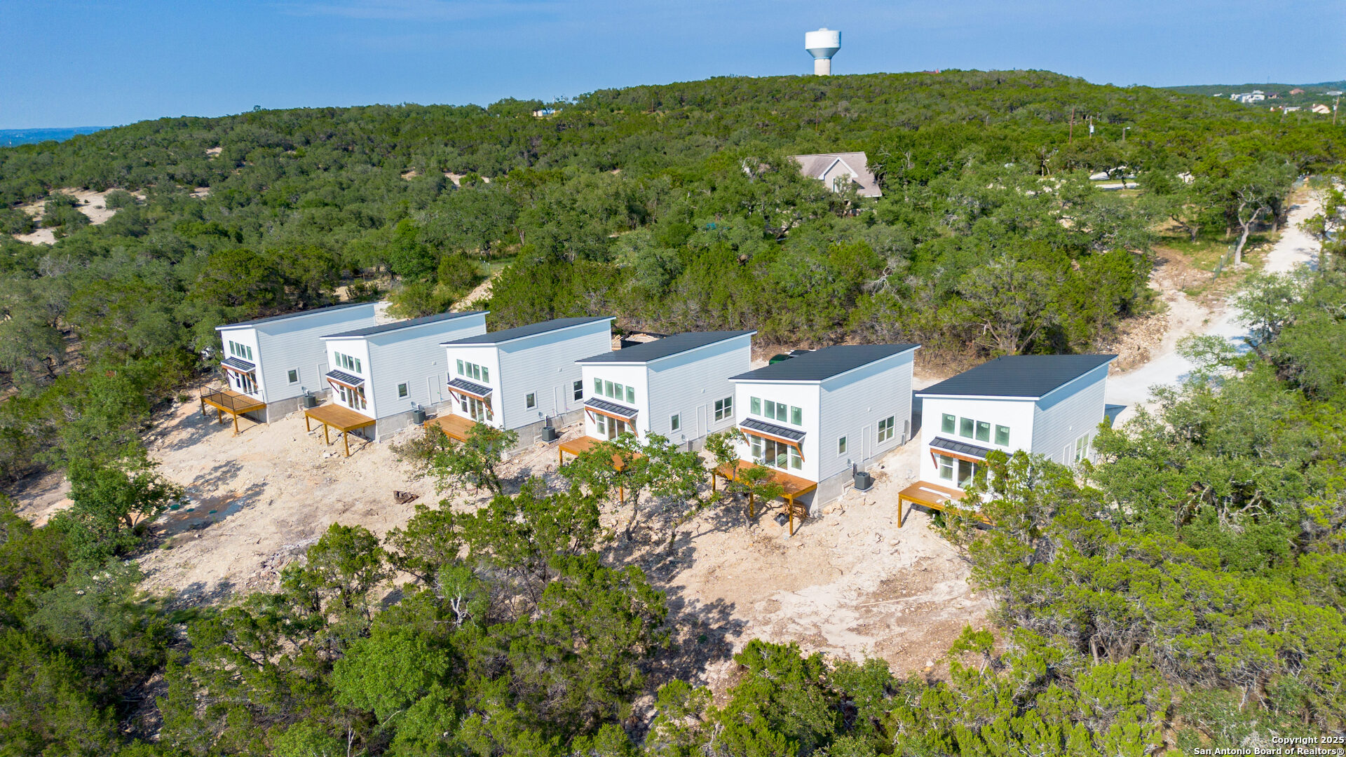 2004 Cedar Hill Drive, Unit 5 Spring Branch, TX 78070 - Photo 23 of 27 an aerial view of a house