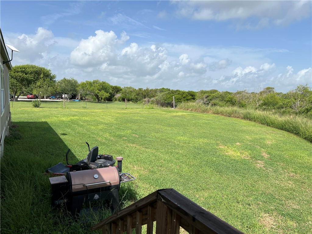 1903 1st Street Bayside, TX 78340 - Photo 11 of 38 a view of a two chairs in the garden