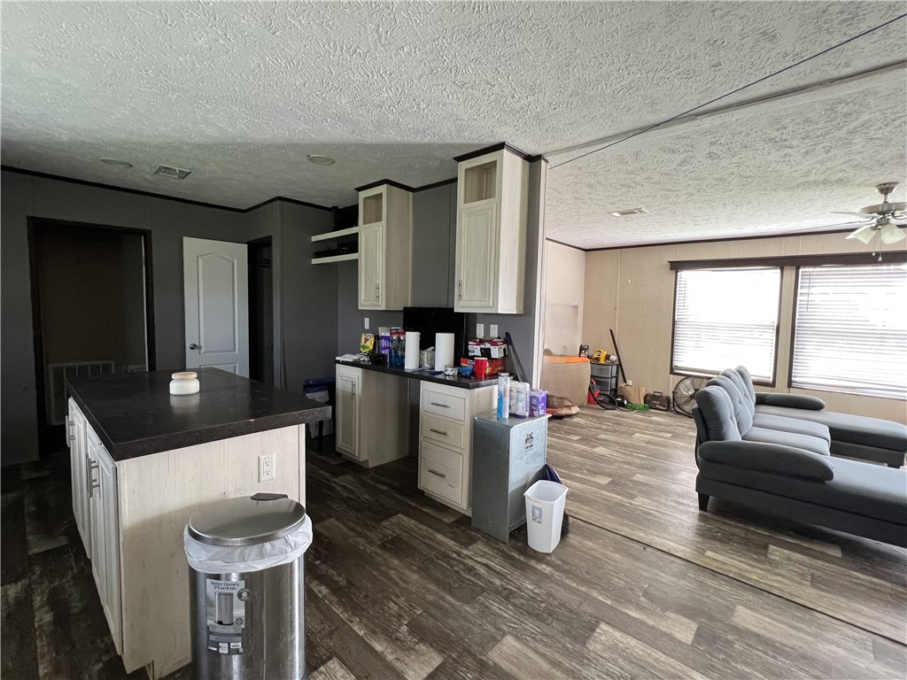 1903 1st Street Bayside, TX 78340 - Photo 17 of 38 a living room with furniture and a large window