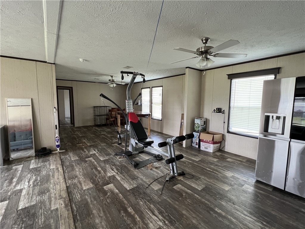 1903 1st Street Bayside, TX 78340 - Photo 18 of 38 a view of a room with wooden floor and furniture