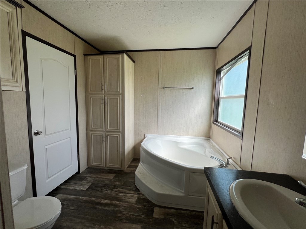 1903 1st Street Bayside, TX 78340 - Photo 21 of 38 a bathroom with a sink and a mirror