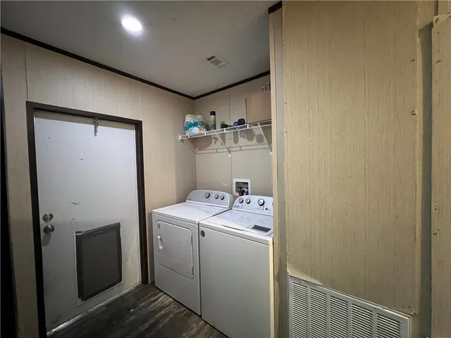 a utility room with dryer and washer