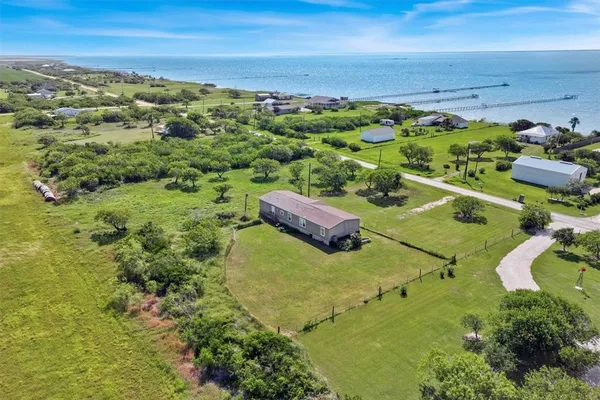 a view of a yard with an outdoor space