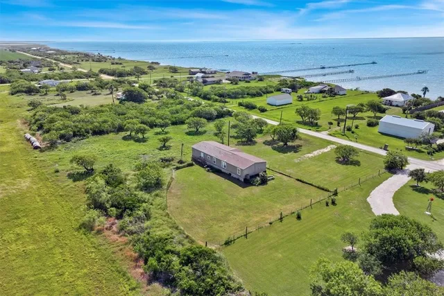 a view of a yard with an outdoor space
