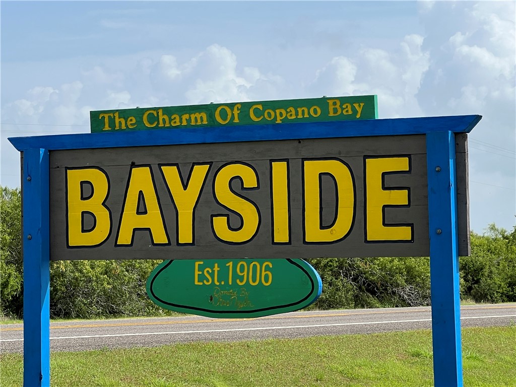 1903 1st Street Bayside, TX 78340 - Photo 38 of 38 a sign that is on a wooden wall