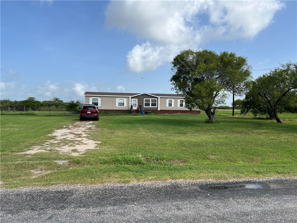 1903 1st Street Bayside, TX 78340 - Photo 5 of 38 a view of a house with a yard