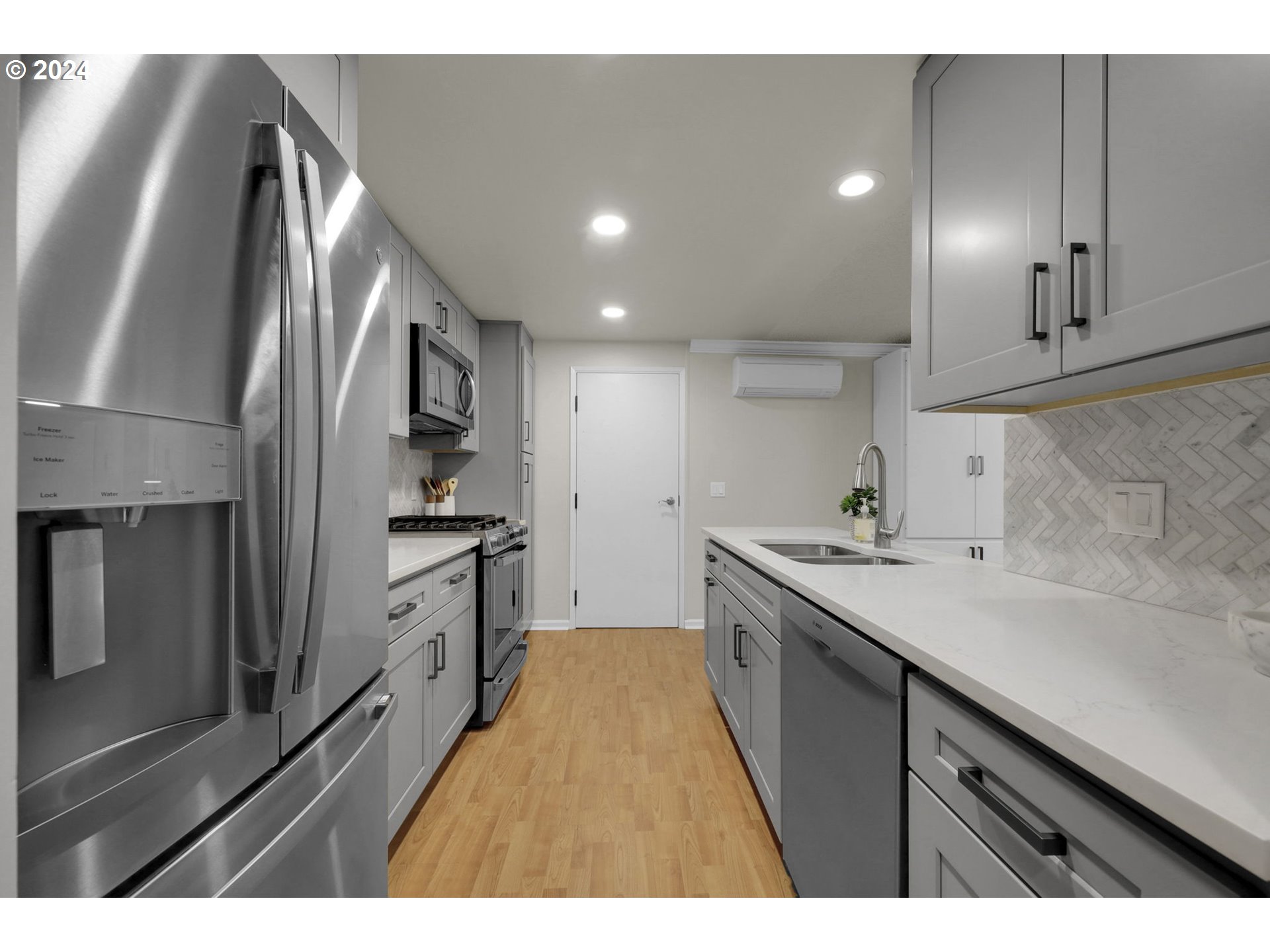 100 Westbrook Way Eugene, OR 97405 - Photo 22 of 48 a kitchen that has a sink and a stove