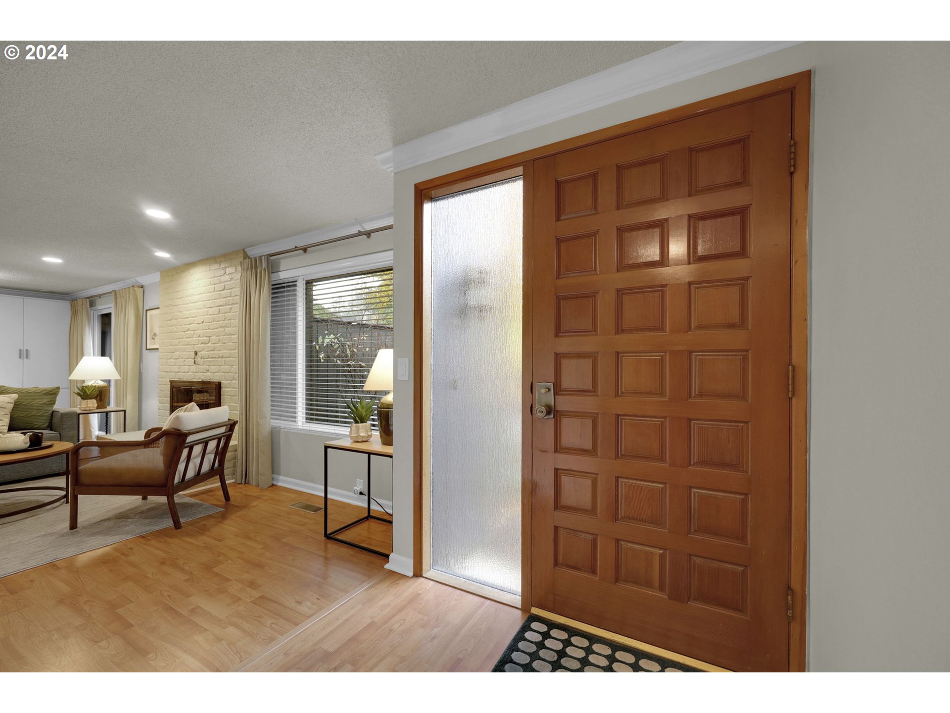 100 Westbrook Way Eugene, OR 97405 - Photo 5 of 48 a living room with furniture cabinets and a window