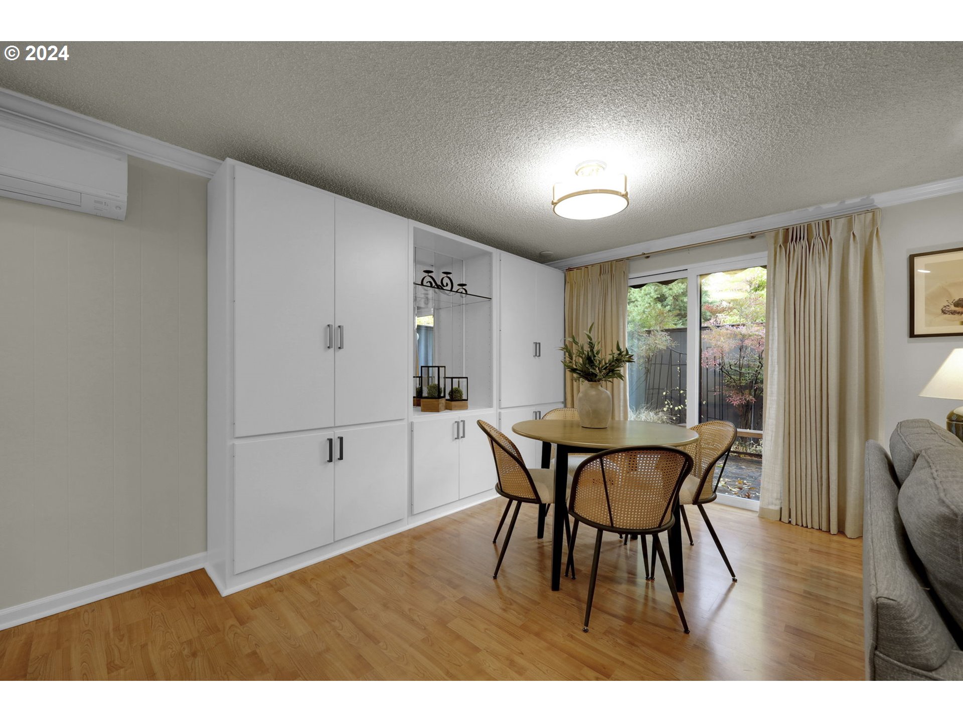 100 Westbrook Way Eugene, OR 97405 - Photo 9 of 48 a view of a dining room with furniture and wooden floor
