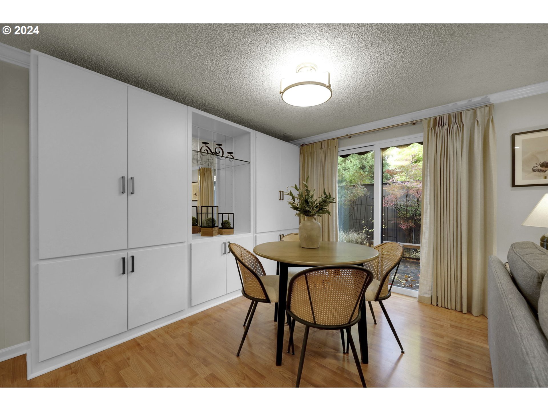 100 Westbrook Way Eugene, OR 97405 - Photo 10 of 48 a view of a dining room with furniture and wooden floor