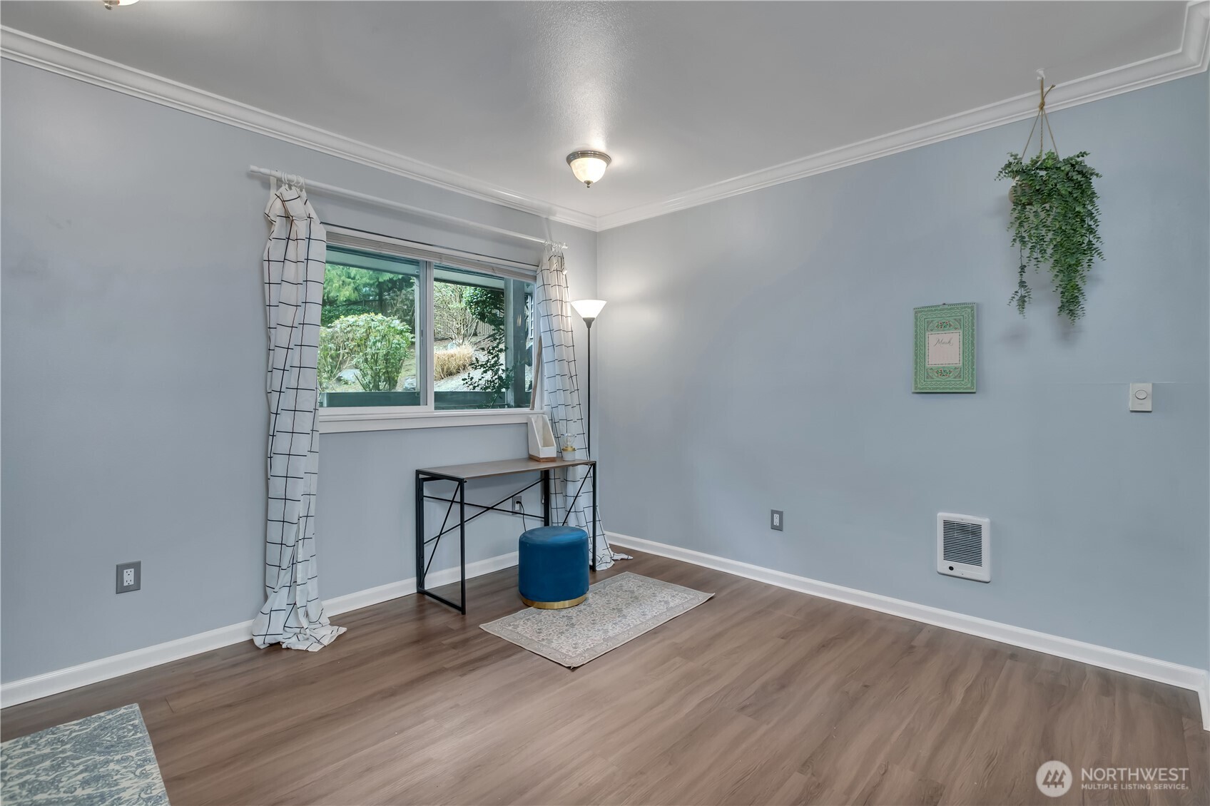 15310 Macadam Road South, Unit A204 Tukwila, WA 98188 - Photo 14 of 25 a view of empty room with wooden floor and fan