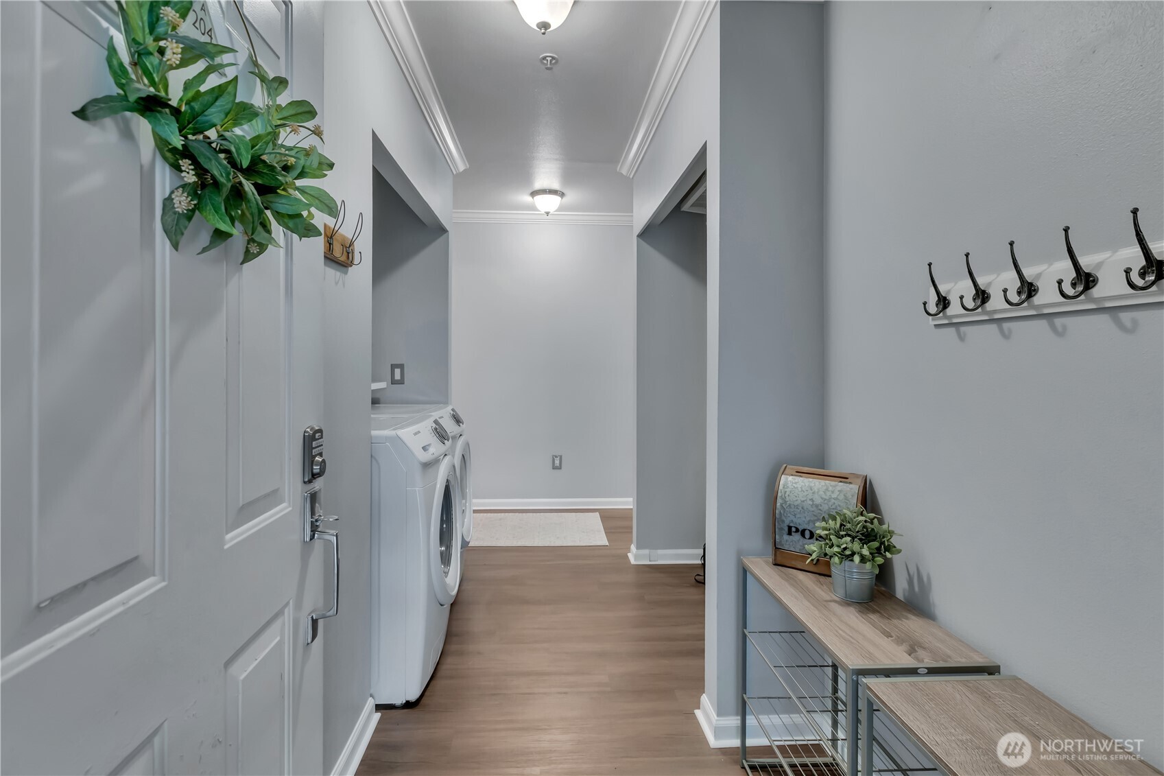 15310 Macadam Road South, Unit A204 Tukwila, WA 98188 - Photo 2 of 25 a view of an entryway with wooden floor