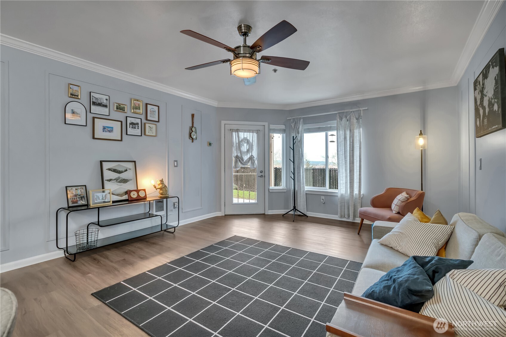 15310 Macadam Road South, Unit A204 Tukwila, WA 98188 - Photo 5 of 25 a living room with furniture and a large window