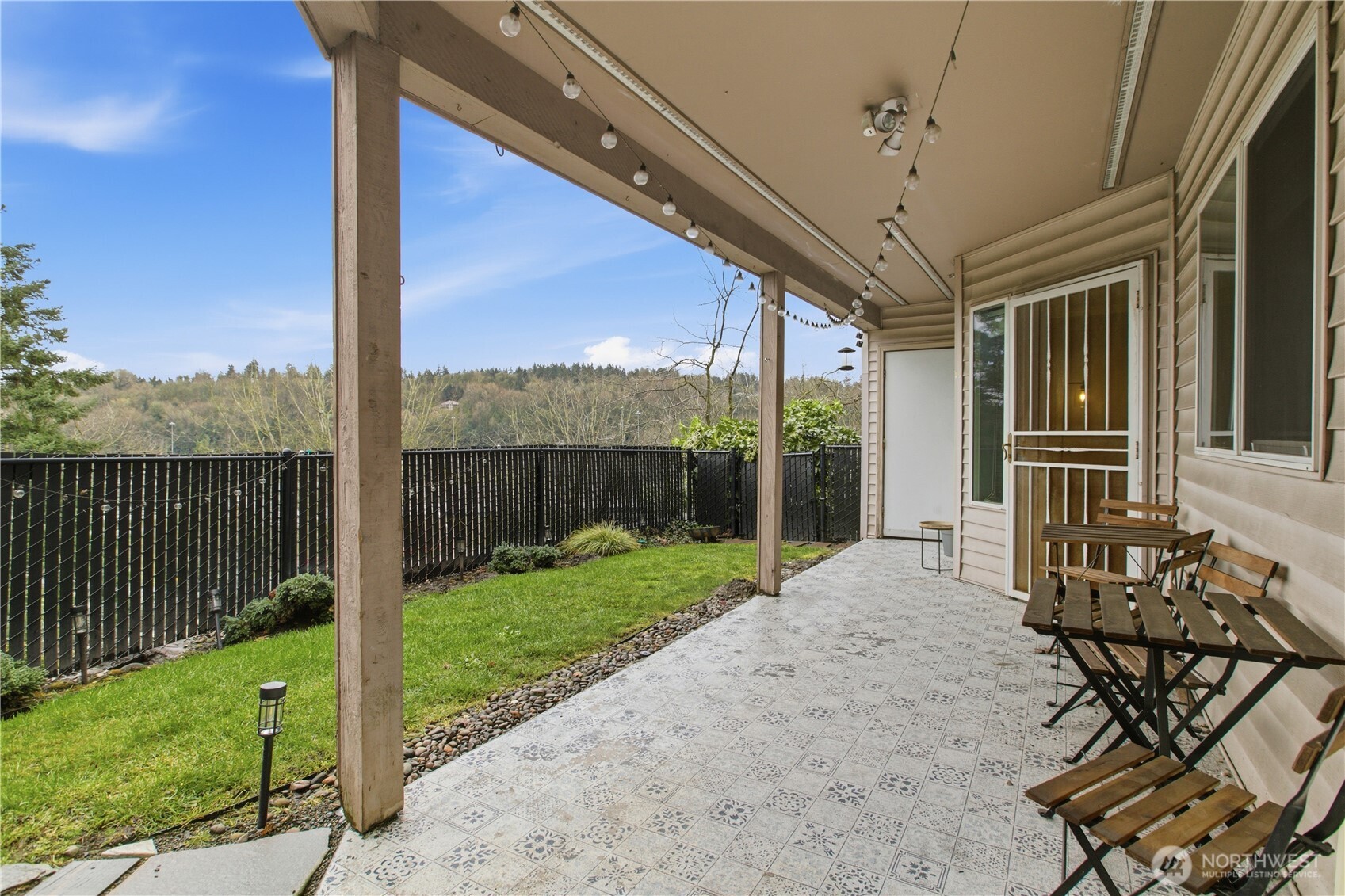 15310 Macadam Road South, Unit A204 Tukwila, WA 98188 - Photo 6 of 25 a view of a porch with furniture and garden