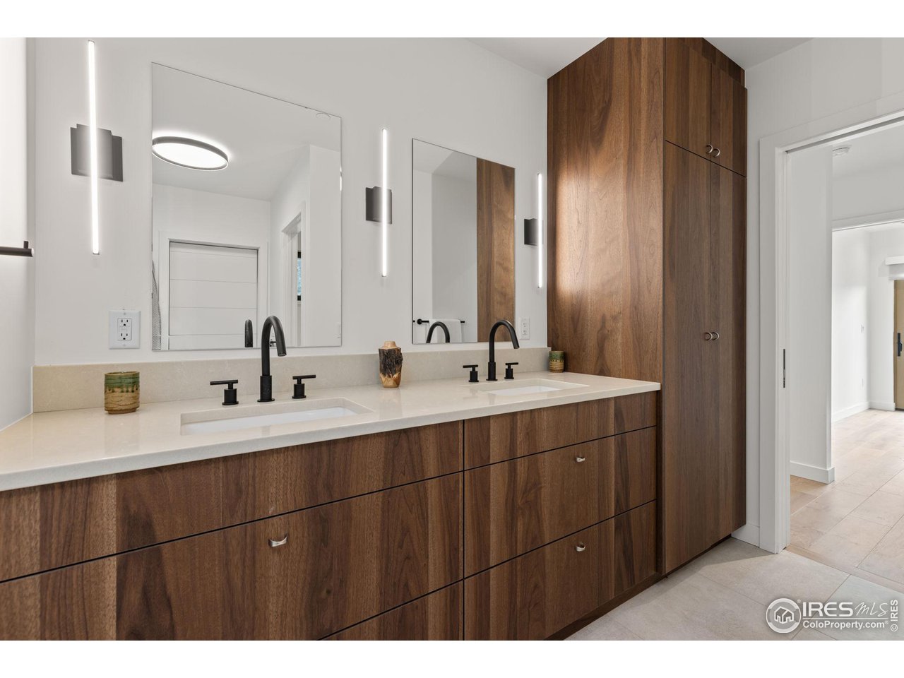 2125 Upland Avenue Boulder, CO 80304 - Photo 11 of 38 a bathroom with a double vanity sink mirror and