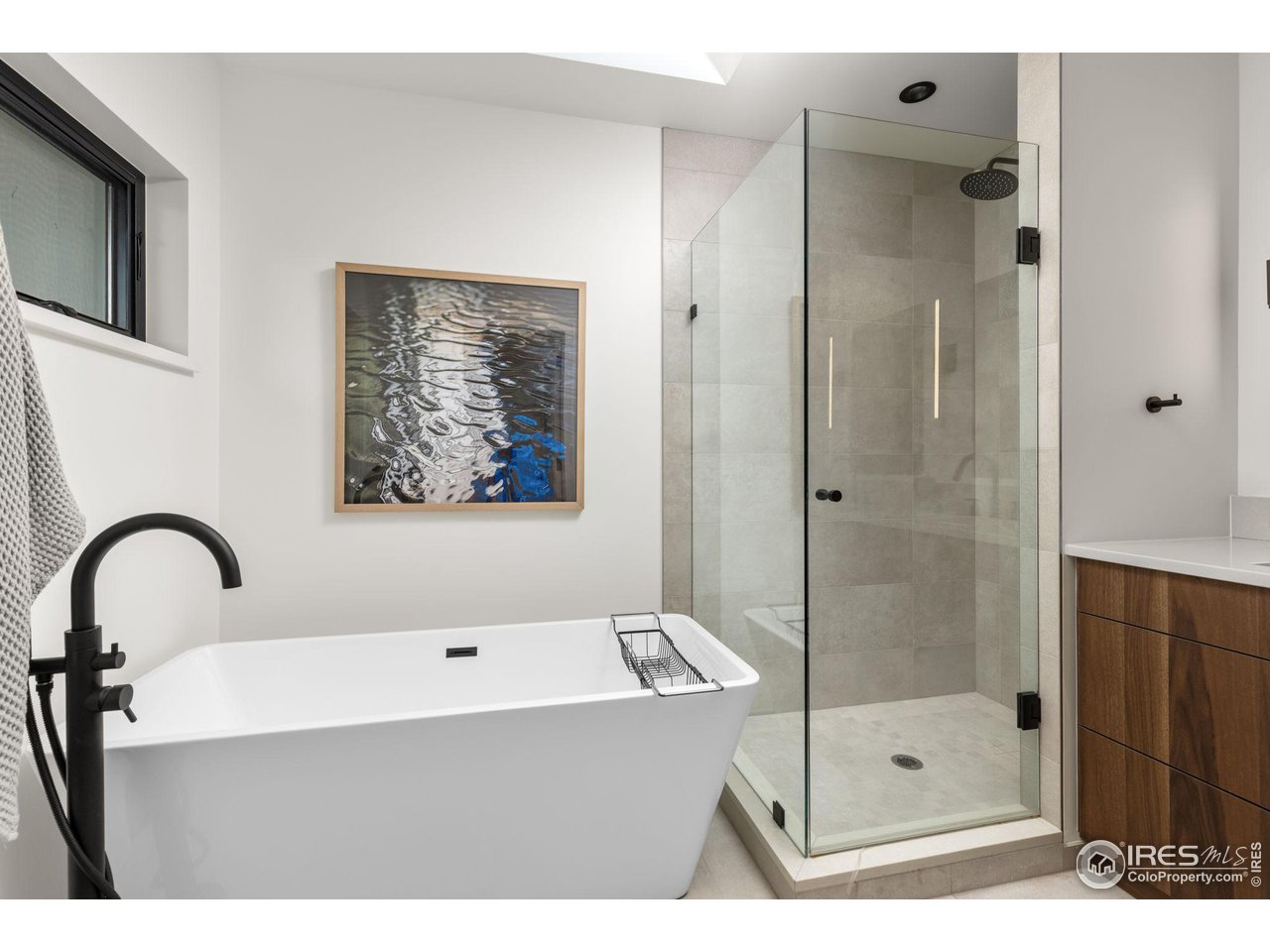 2125 Upland Avenue Boulder, CO 80304 - Photo 12 of 38 a bathroom with a bathtub and a shower
