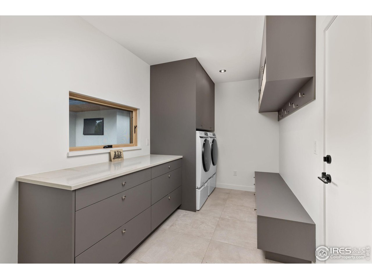 2125 Upland Avenue Boulder, CO 80304 - Photo 19 of 38 a bathroom with a sink and mirror
