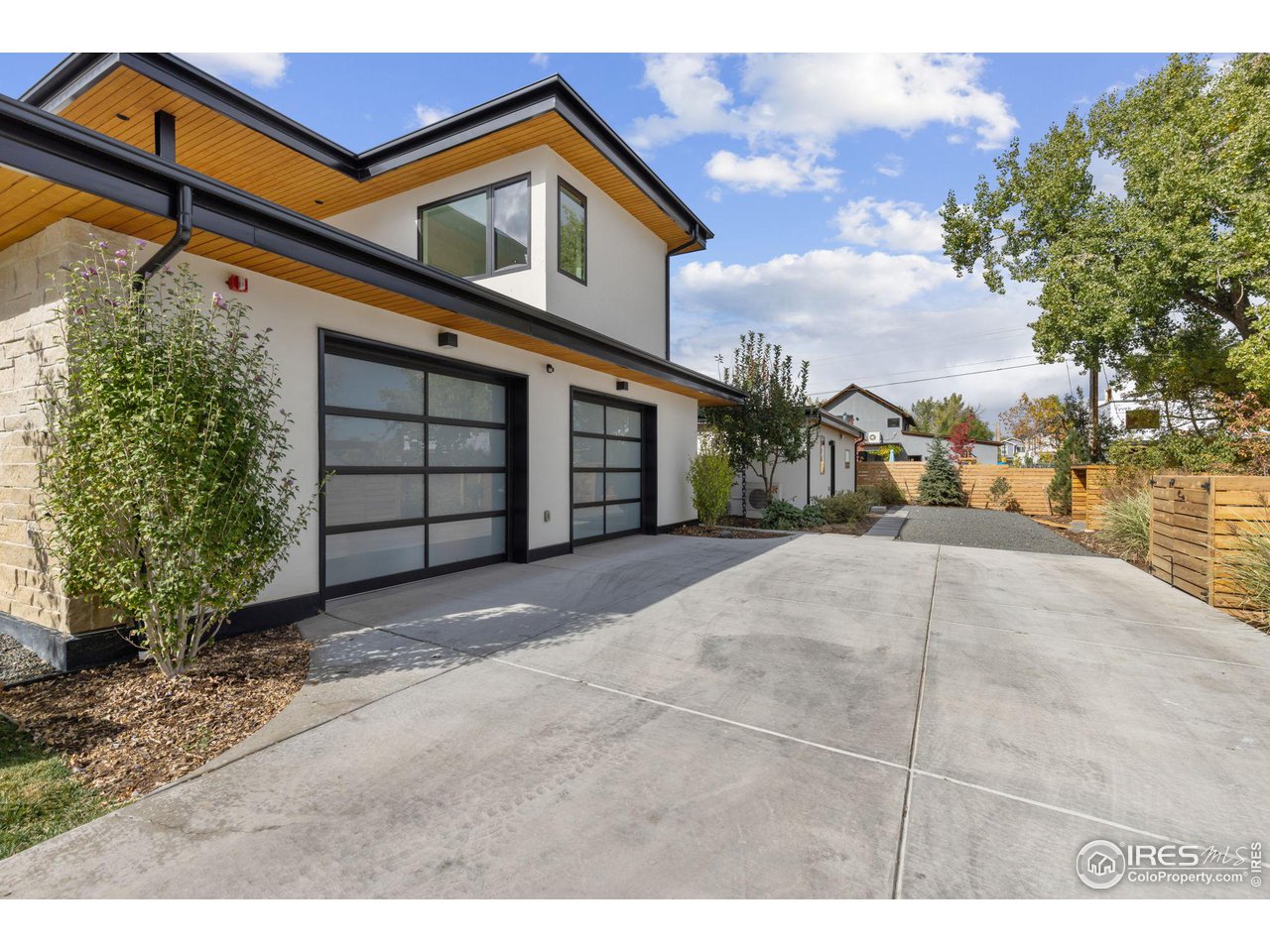 2125 Upland Avenue Boulder, CO 80304 - Photo 31 of 38 a view of a house with a yard
