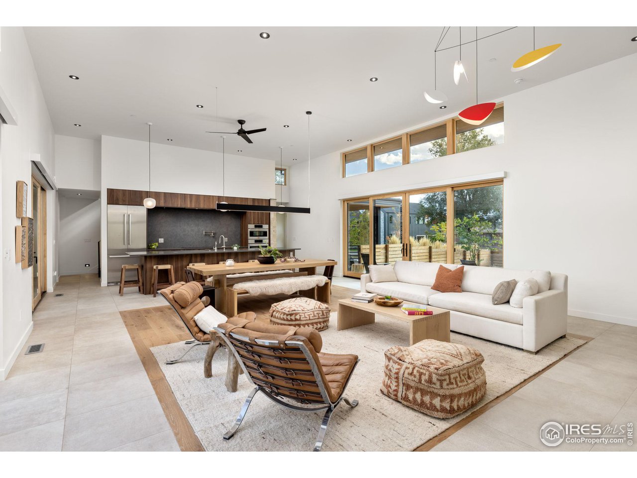 2125 Upland Avenue Boulder, CO 80304 - Photo 7 of 38 a living room with furniture and a flat screen tv