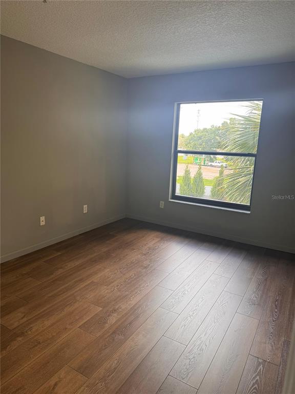 1132 South Pine Ridge Circle, Unit 32 Sanford, FL 32773 - Photo 18 of 26 an empty room with a window
