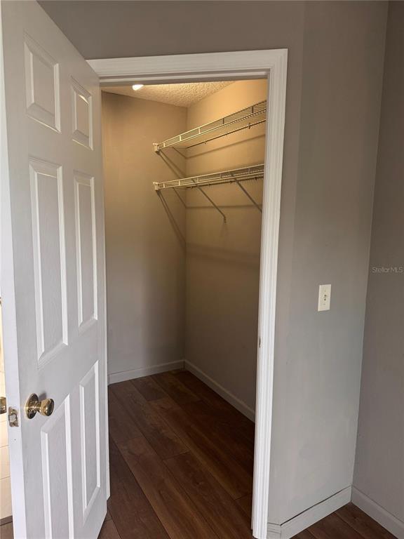 1132 South Pine Ridge Circle, Unit 32 Sanford, FL 32773 - Photo 23 of 26 a view of a walk in closet