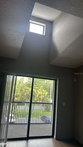 a view of hallway with a window