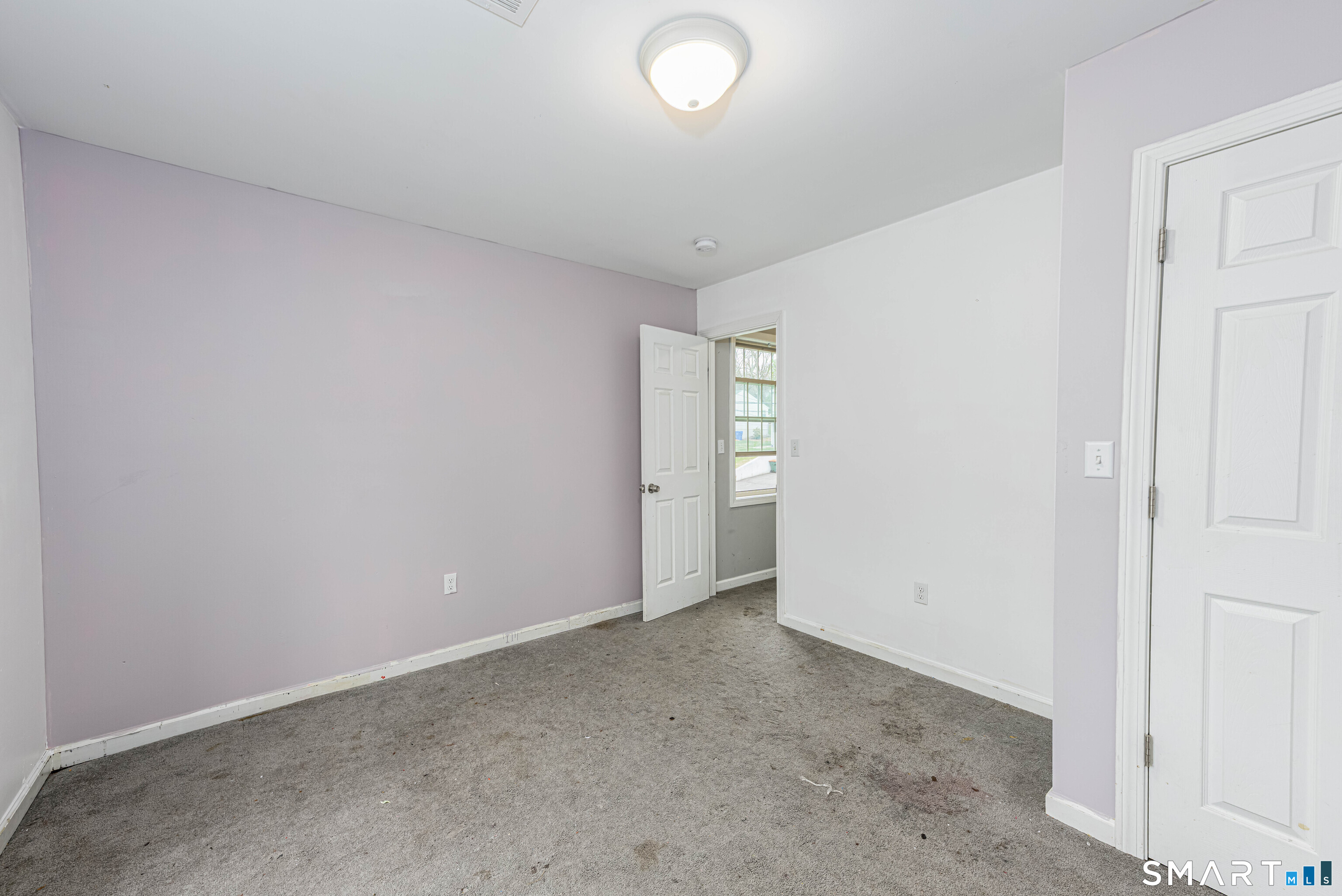 112 Orchard Street Meriden, CT 06450 - Photo 18 of 30 an empty room with windows