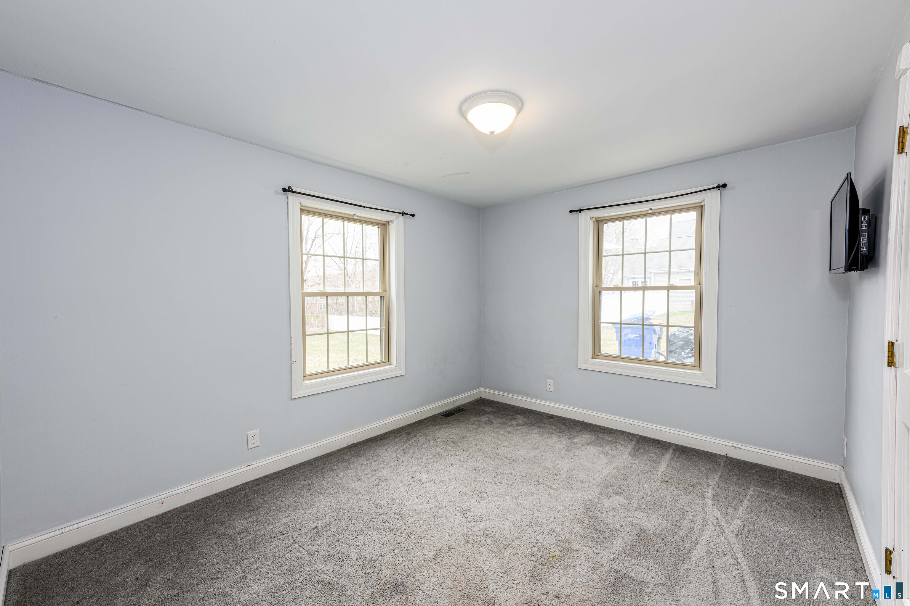 112 Orchard Street Meriden, CT 06450 - Photo 21 of 30 an empty room with windows