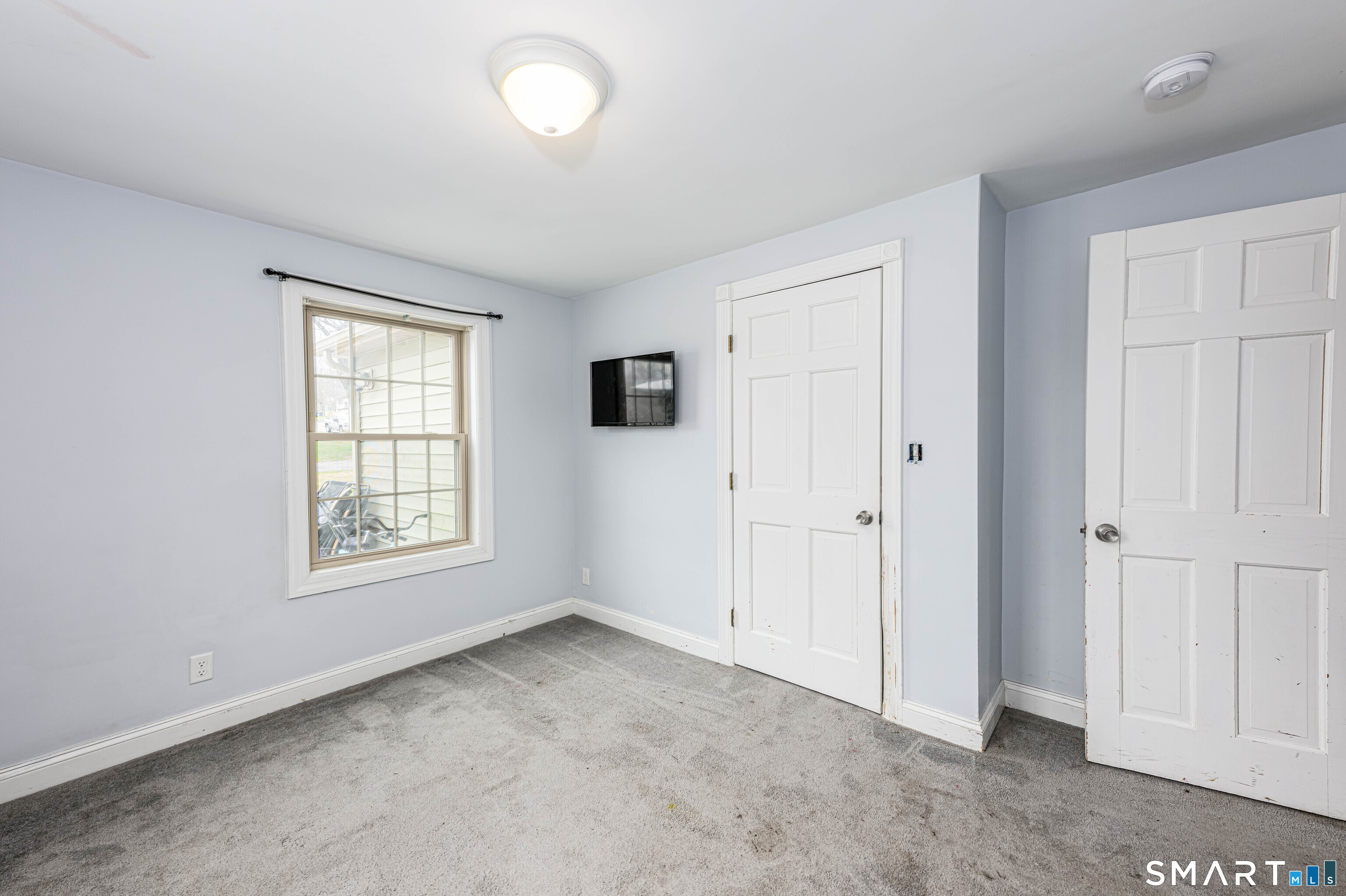 112 Orchard Street Meriden, CT 06450 - Photo 22 of 30 a view of an empty room with a window