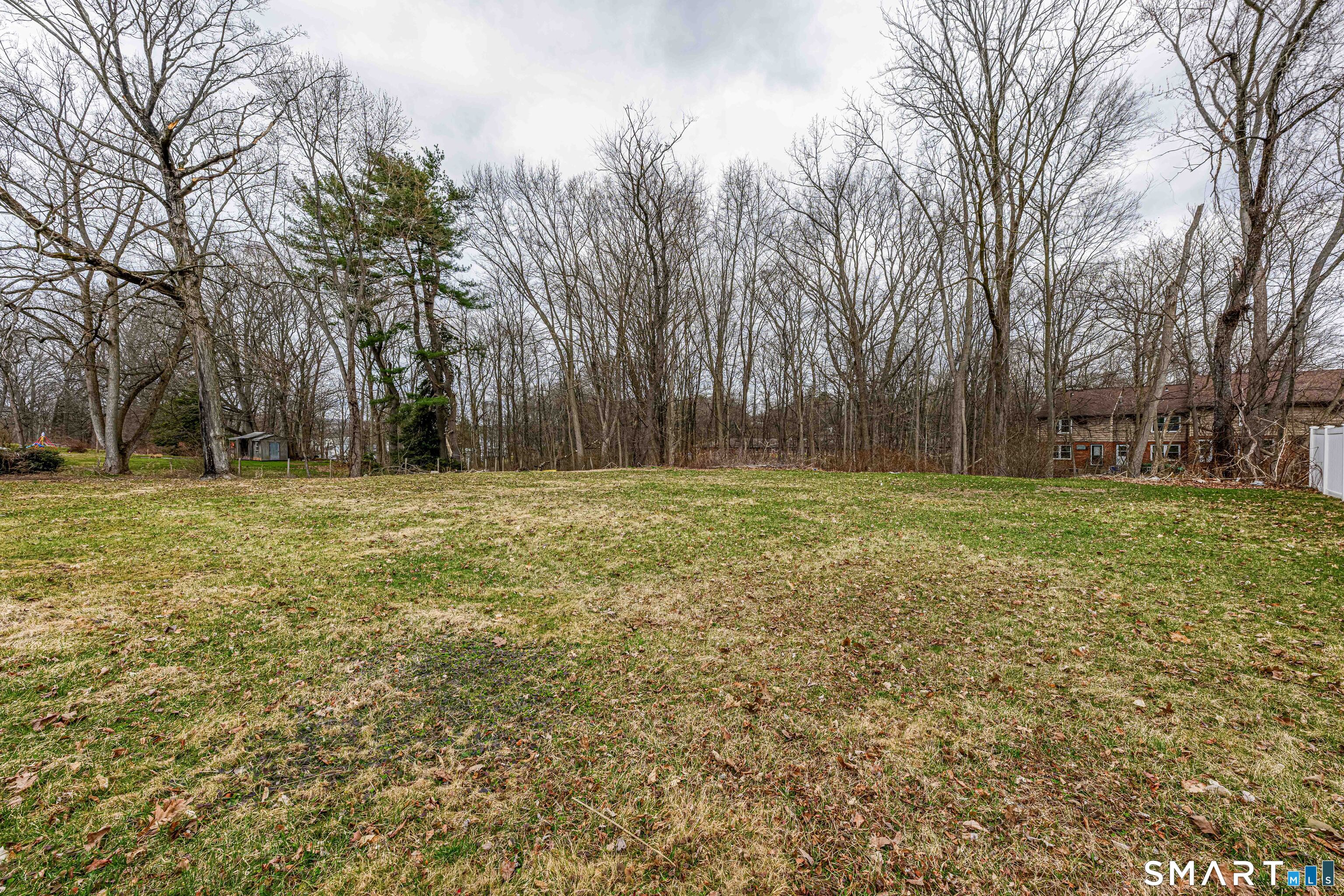 112 Orchard Street Meriden, CT 06450 - Photo 28 of 30 a view of outdoor space with trees all around