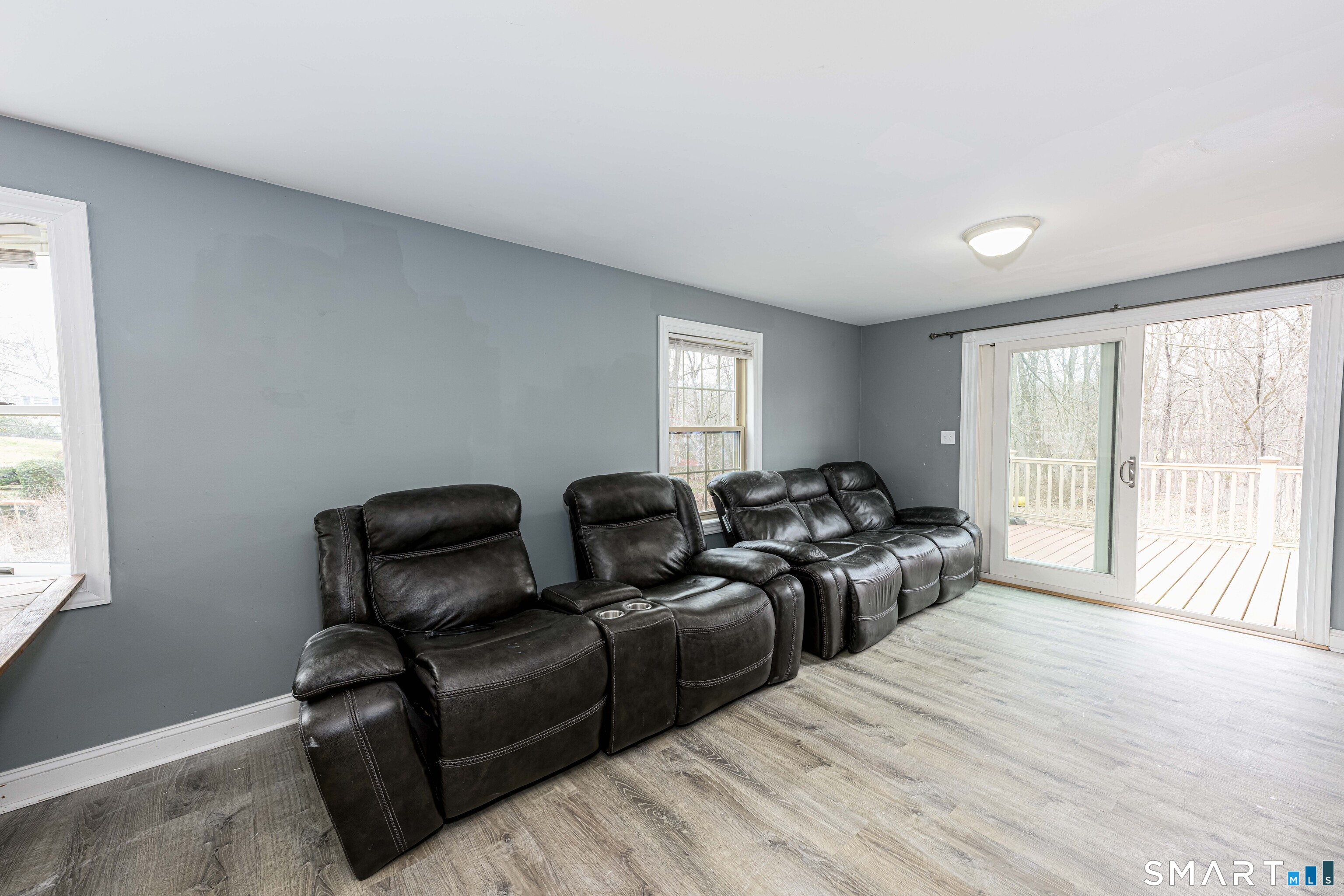 112 Orchard Street Meriden, CT 06450 - Photo 9 of 30 a living room with furniture and a window