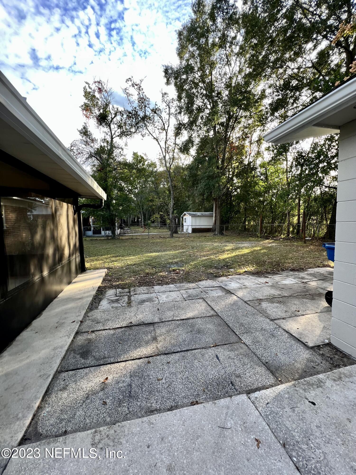 10892 Player Road Jacksonville, FL 32218 - Photo 36 of 37 a view of a yard with plants
