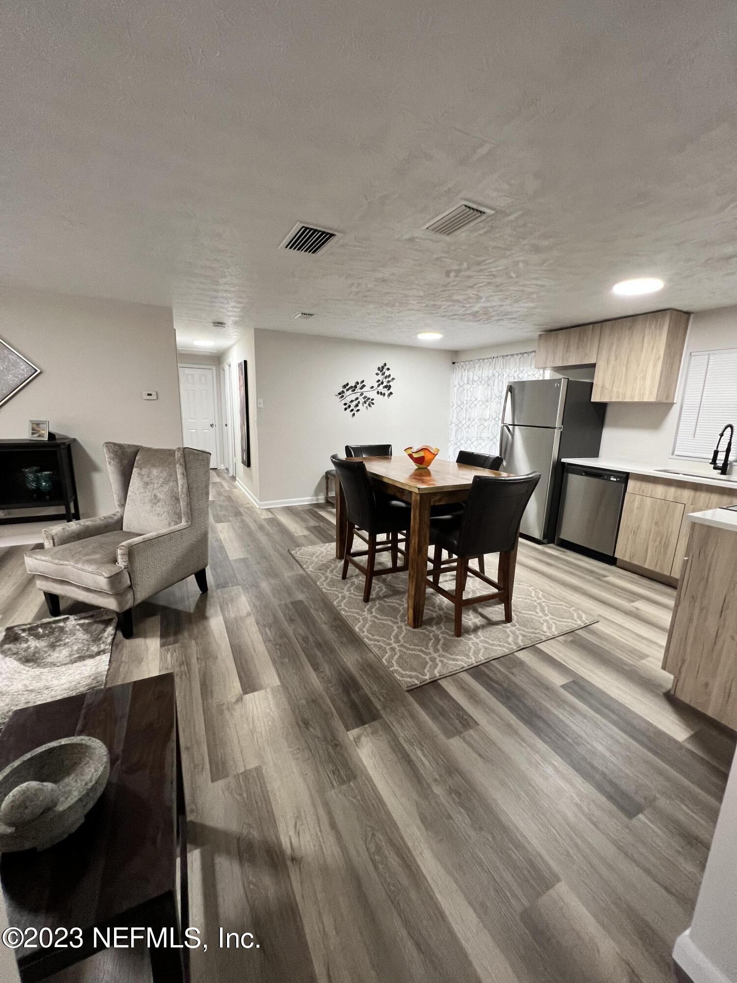 10892 Player Road Jacksonville, FL 32218 - Photo 7 of 37 a view of a dining room with furniture
