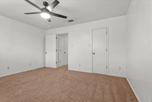 a view of a bathroom with a sink and mirror